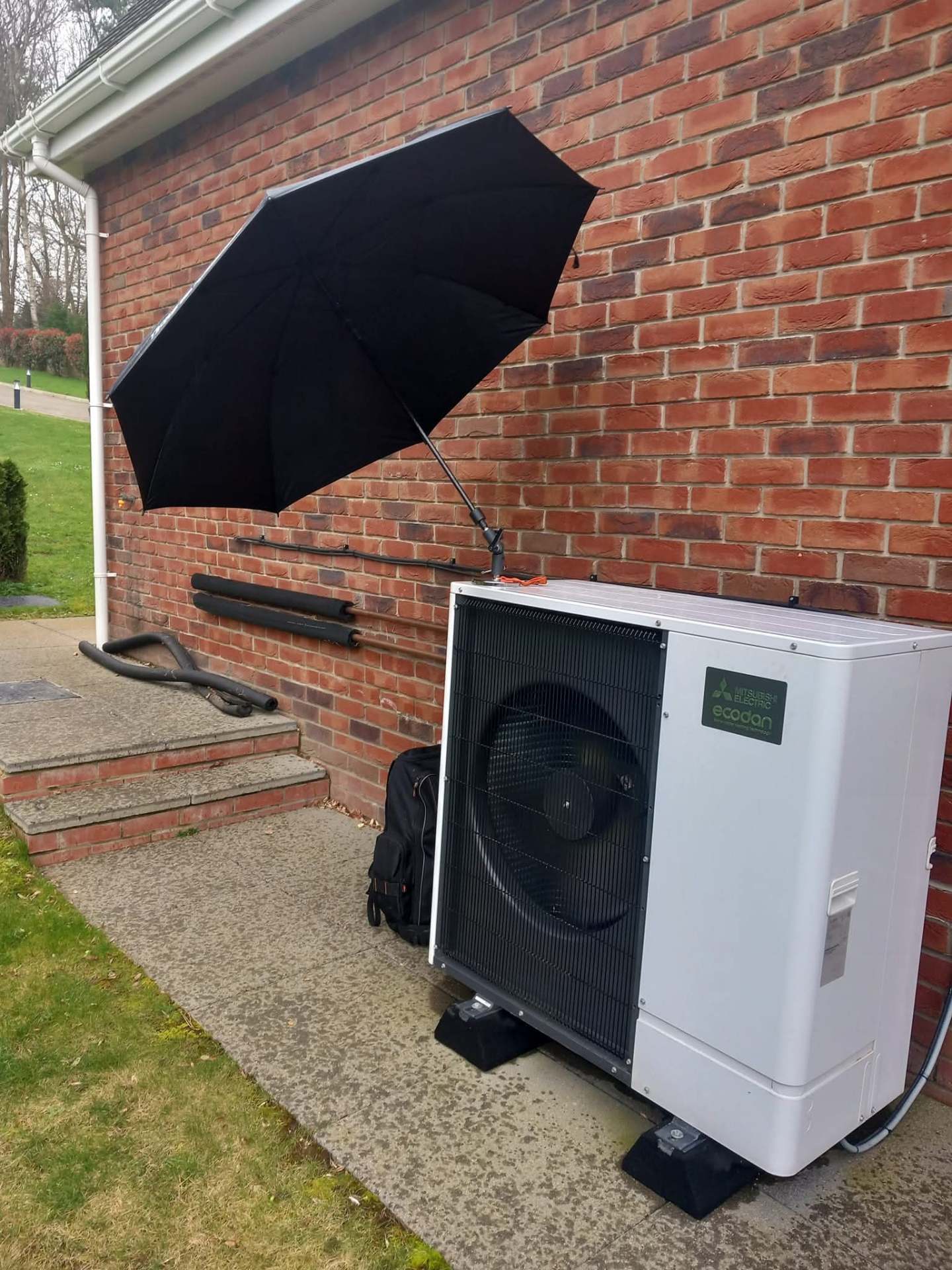 Ecodan heat pump being serviced as part of annual maintenance contract